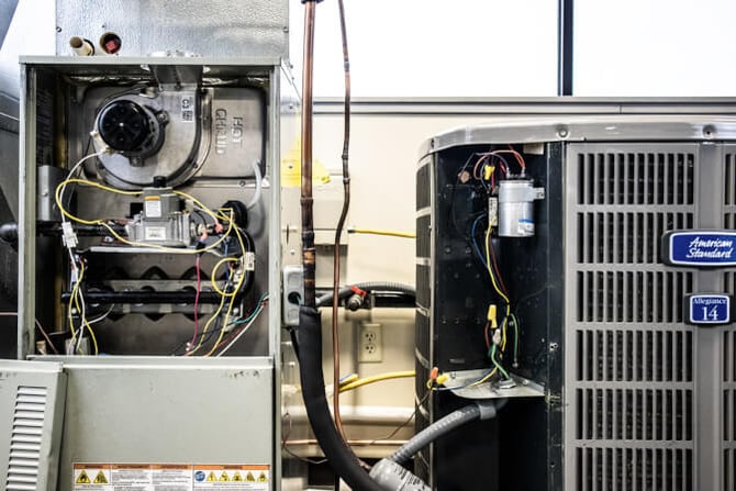 A furnace and AC unit used in the HVAC technician program