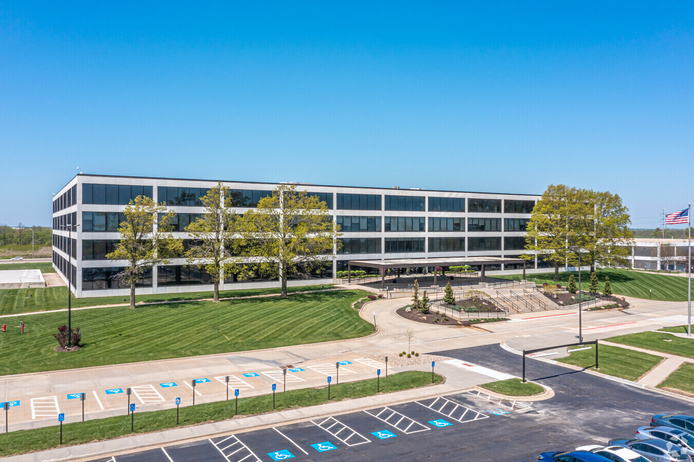 Pinnacle Career Institute campus building exterior and parking lot